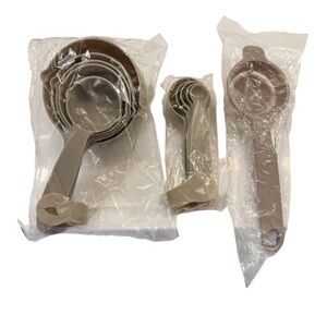 Set of Beige Plastic Measuring Cups, Spoons, & Egg York Egg White Filter